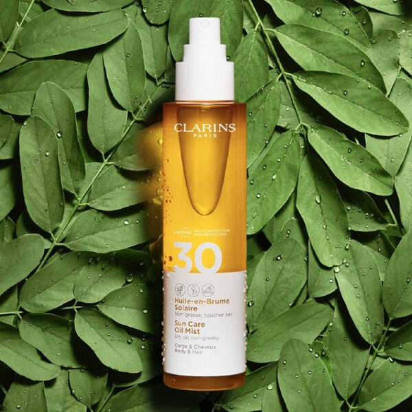 Clarins mgiełka do opalania ciała i włosów SPF 30 150ml - obrazek 3